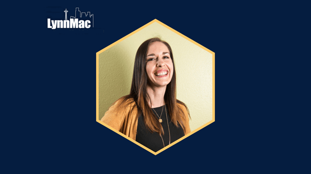 Woman smiling in front of a light green background, with "LynnMac" logo in the corner.